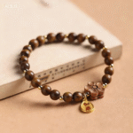Wooden Bead Bracelet with Flower & Lucky Charm