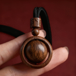 Wooden Spinning Sphere Pendant Necklace with Engraved Bead