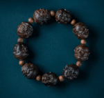 Qin Nan carving water-sinked chenxiang eighteen arhats bracelet, high-end cultural and entertainment wood Buddha bead necklace, about 18*19mm*9 beads