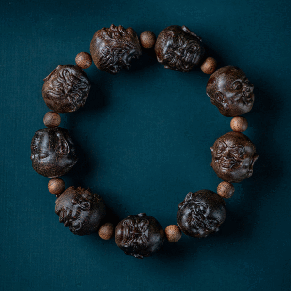 Qin Nan carving water-sinked chenxiang eighteen arhats bracelet, high-end cultural and entertainment wood Buddha bead necklace, about 18*19mm*9 beads