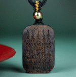 Qinan Agarwood Carved Five Scripture Pendant