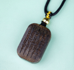 Qinan Agarwood Carved Five Scripture Pendant