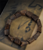 Follow the wrist, an agarwood Buddhist bead bracelet.