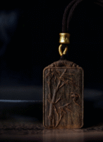 Bamboo symbolizes peace, carved in agarwood.