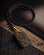 Bamboo symbolizes peace, carved in agarwood.