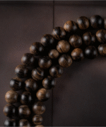 Agarwood rosary bracelet with 108 Buddha beads.