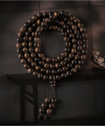 Agarwood rosary bracelet with 108 Buddha beads.