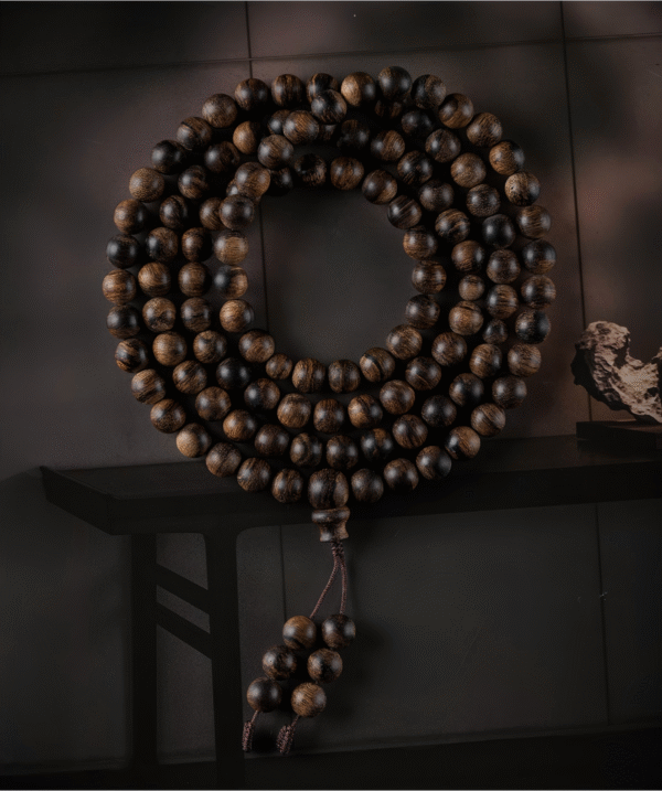 Agarwood rosary bracelet with 108 Buddha beads.
