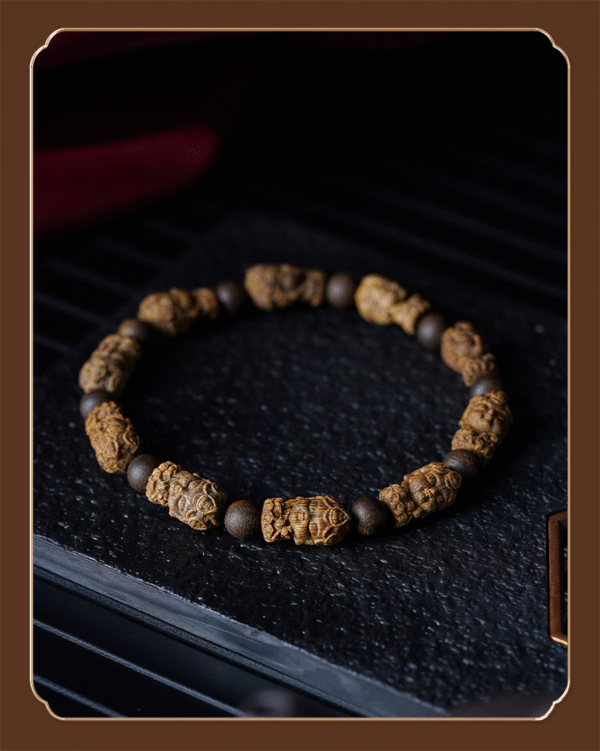 Agarwood carved bracelet.
